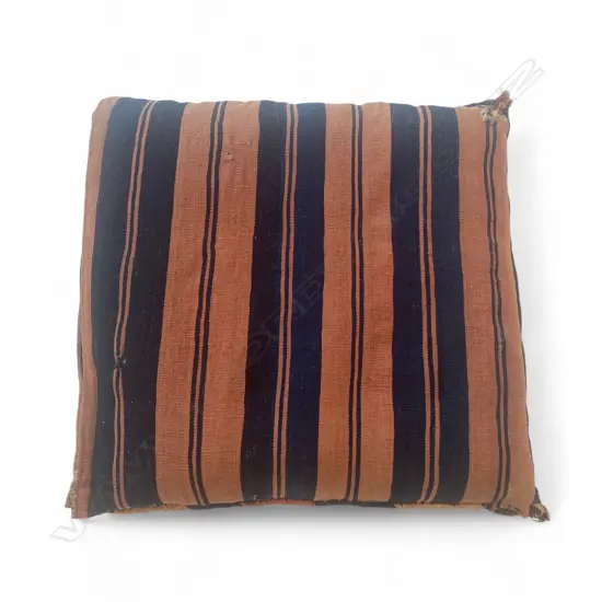 A wool bag/cushion,
